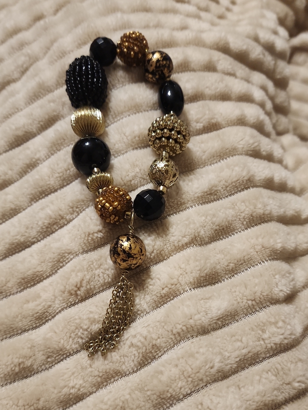 Chico's Black and Gold Beaded Tassel Bracelet